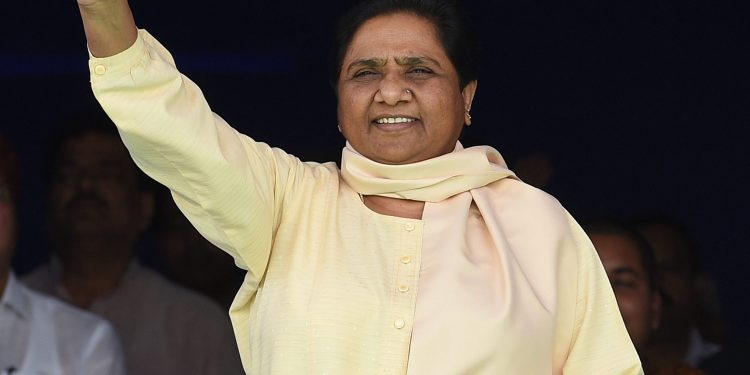 Lucknow: Bahujan Samaj Party (BSP ) supremo Mayawati waves at supporters at a rally on the occasion of 126th birth anniversary of Dr B R Ambedkar at Ambedkar Memorial in Lucknow on Friday. PTI Photo by Nand Kumar  (PTI4_14_2017_000105B)