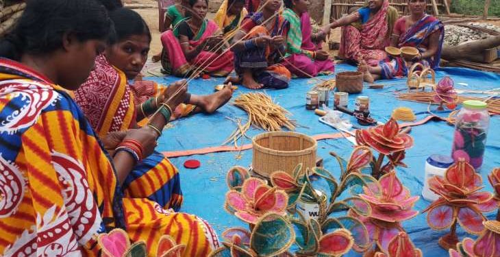 Womenfolk creating paddy artworks in Khudapej village of Nuapada district in Odisha.