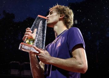 The championship match at this clay-court tennis event Saturday was marred by two long rain delays before the fifth-ranked Zverev finally clinched the win in two hours and 37 minutes.