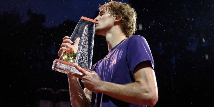 The championship match at this clay-court tennis event Saturday was marred by two long rain delays before the fifth-ranked Zverev finally clinched the win in two hours and 37 minutes.