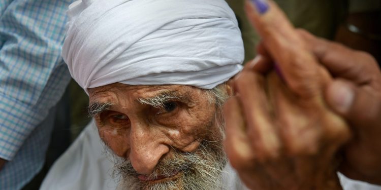 Bachan Singh after casting his vote, Sunday