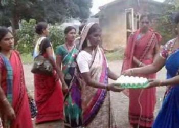 In this village, women throw eggs at temple for sons’ long life