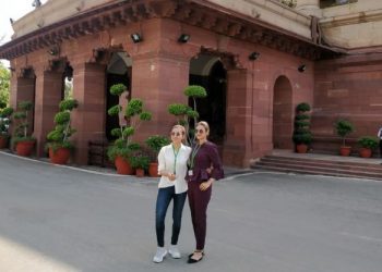 Mimi Chakrabarty (in white top) and Nusrat Jehan