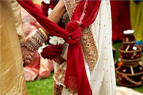 Weird wedding ceremony where groom stays at home