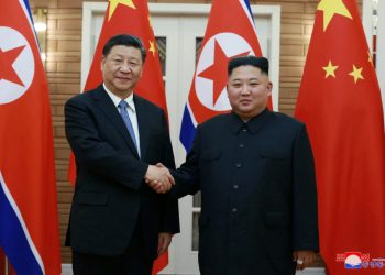 Xi-Jinping with North Korea leader Kim Jong-un.