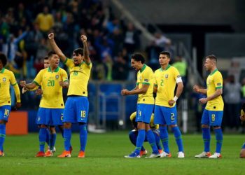 Brazilian players celebrate after winning the shootout against Paraguay