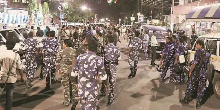 Police officers led by Barrackpore Police Commissioner Manoj Kumar Verma conducted route marches to reassure people of peace.