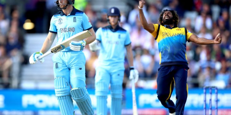 England's Jos Buttler (left) appears dejected after being dismissed by Sri Lanka's Lasith Malinga during the ICC Cricket World Cup group stage match at Headingley, Leeds. (Photo by Tim Goode/PA Images via Getty Images)