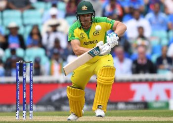 Australian skipper Aaron Finch tries to steal a single while batting