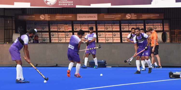 Indian players go through their training drills at the Kalinga Stadium in Bhubaneswar, Thursday