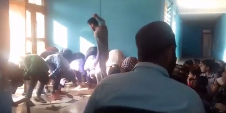 The video shows the teacher assaulting the students for being late by 10 minutes for the class at a hostel for tribal Gujjar and nomadic Bakarwal children in Doda district.