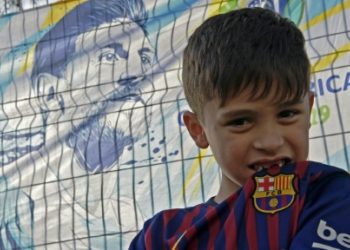 he six-year-old from Alvorada, a suburb of Porto Alegre, is waiting at the gates of the Beira Rio stadium alongside his mother Lisiana Maier, hoping to speak to Barcelona and Argentina superstar Messi.