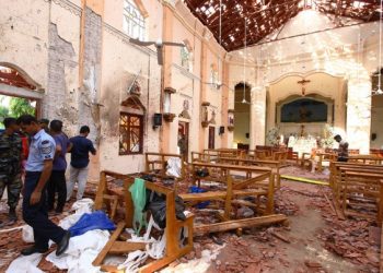 NEGOMBO, SRI LANKA - APRIL 21: Sri Lankan officials inspect St. Sebastian's Church in Negombo, north of Colombo, after multiple explosions targeting churches and hotels across Sri Lanka on April 21, 2019, in Negombo, Sri Lanka. At least 207 people have been killed and hundreds more injured after multiple explosions rocked three churches and three luxury hotels in and around Colombo as well as at Batticaloa in Sri Lanka during Easter Sunday mass. According to reports, at least 400 people were injured and are undergoing treatment as the blasts took place at churches in Colombo city as well as neighboring towns and hotels, including the Shangri-La, Kingsbury and Cinnamon Grand, during the worst violence in Sri Lanka since the civil war ended a decade ago. Christians worldwide celebrated Easter on Sunday, commemorating the day on which Jesus Christ is believed to have risen from the dead. (Photo by Stringer/Getty Images)