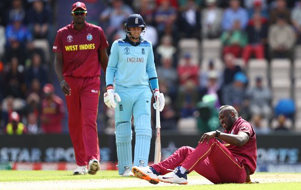SOUTHAMPTON, ENGLAND - JUNE 14: Andre Russell of West Indies lies on the wicket after injuring himself bowling during the Group Stage match of the ICC Cricket World Cup 2019 between England and West Indies at The Ageas Bowl on June 14, 2019 in Southampton, England. (Photo by Michael Steele/Getty Images)