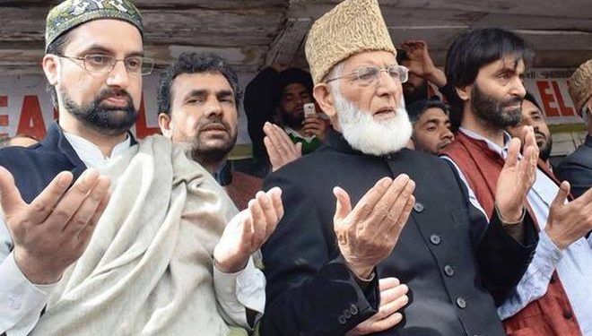 Separatists Mirwaiz Umar Farooq (left) and Syed Ali Shah Geelani (centre).