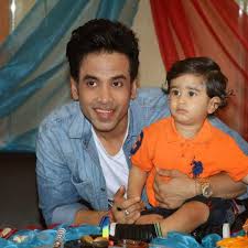 Tusshar Kapoor with his son Laksshya Kapoor on his 1st birthday