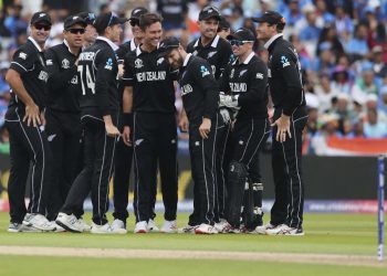 Trent Boult (without cap) celebrates with teammates after dismissing Virat Kohli, Wednesday