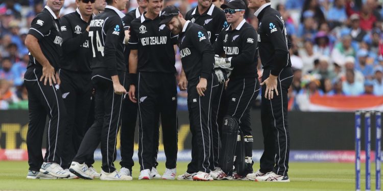 Trent Boult (without cap) celebrates with teammates after dismissing Virat Kohli, Wednesday