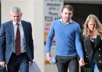 Jack Bobridge (centre) arrives at the court in Perth