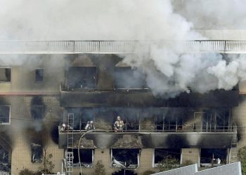 Eyewitnesses described a fire that was like ‘looking at hell’, after a man apparently doused the production company office in the city of Kyoto with flammable liquid and set it alight.