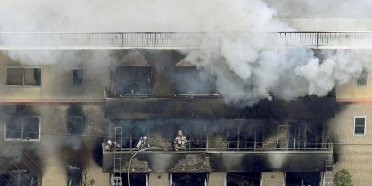Eyewitnesses described a fire that was like ‘looking at hell’, after a man apparently doused the production company office in the city of Kyoto with flammable liquid and set it alight.