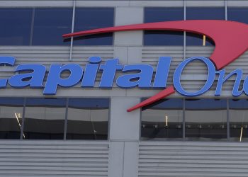 A Capital One sign is shown at a location in San Francisco, Tuesday, July 16, 2019. (AP Photo/Jeff Chiu)