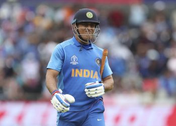 MS Dhoni reacts while leaving the ground after his dismissal in the game against New Zealand