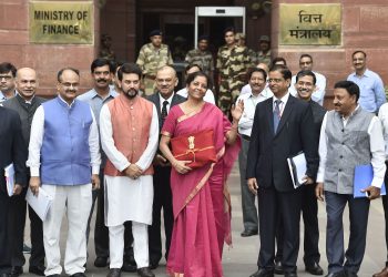 Nirmala Sitharaman holds on to the budget papers wrapped in red cloth . File Image