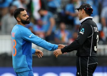 Virat Kohli congratulates Ross Taylor after the ICC World Cup Semifinal at Old Trafford, Wednesday