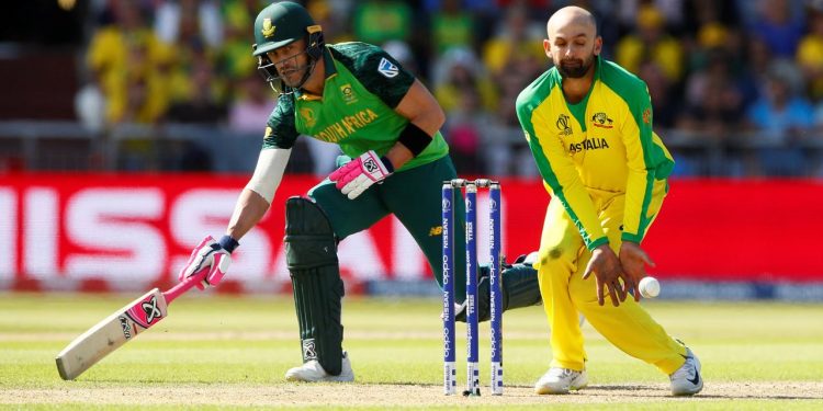 Nathan Lyon (in yellow) in the game against South Africa