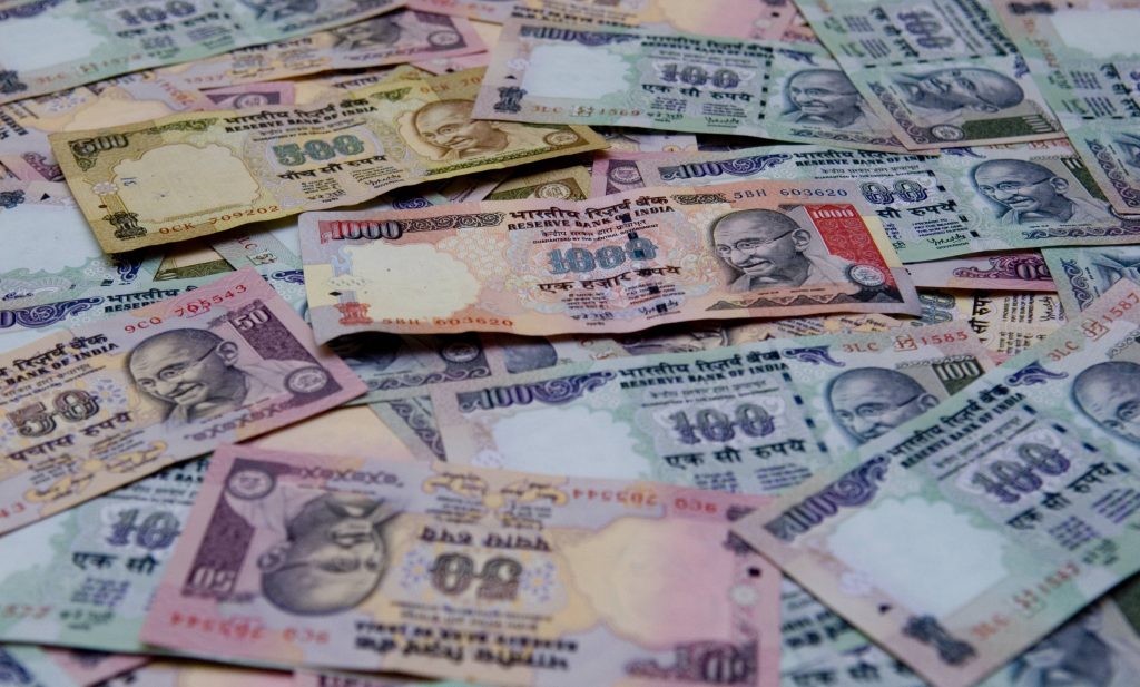 Rupee slips 14 paise to 71.11 against USD in early trade