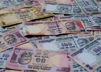 Rupee slips 14 paise to 71.11 against USD in early trade