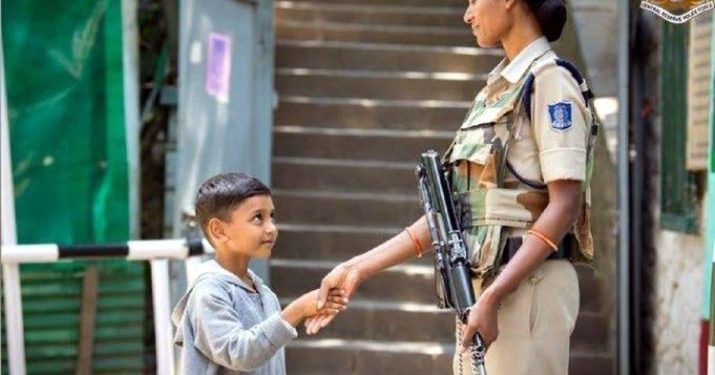 Adorable photo of Kashmiri child shaking hands with CRPF personnel wins hearts