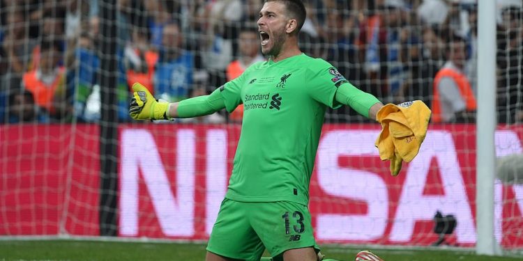Goalkeeper Adrian of Liverpool celebrates after saving a crucial spot-kick against Chelsea in the Super Cup final, Wednesday