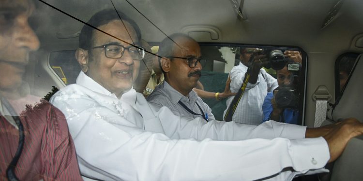 P Chidambaram being taken to a Delhi Court by CBI officials, Thursday