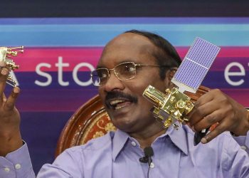 ISRO chairman K Sivan displays the Orbiter and the Rover in Bangalore, Tuesday