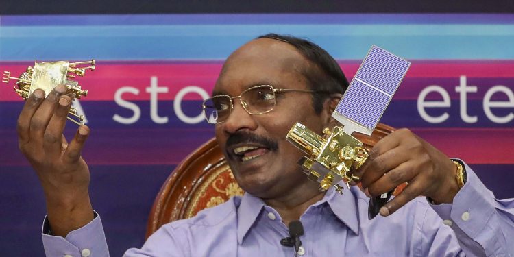 ISRO chairman K Sivan displays the Orbiter and the Rover in Bangalore, Tuesday