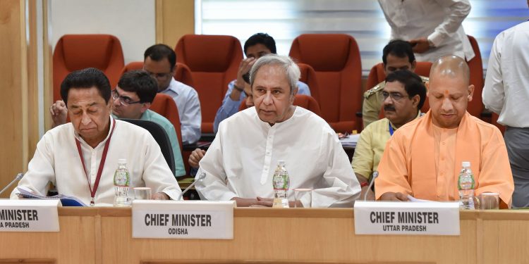 Odisha Chief Minister Naveen Patnaik along with MP CM Kamal Nath (L) and UP Chief Minister Yogi Adityanath during the meeting, Monday at New Delhi