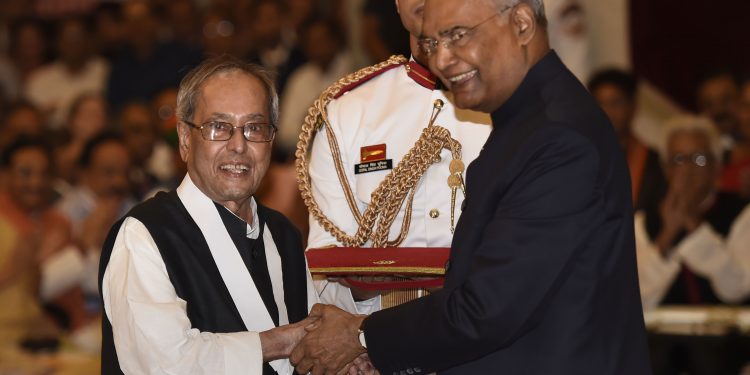 President Ram Nath Kovind confers Bharat Ratna upon former president Pranab Mukherjee during a ceremony at Rashtrapati Bhavan, in New Delhi, Thursday,. (PTI)