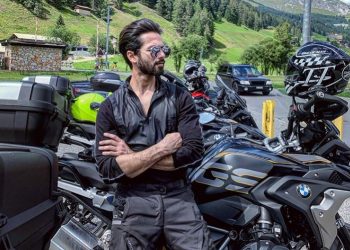 The ‘Kabir Singh’ star shared a photograph of himself, leaning on his bike and with a picturesque countryside backdrop.