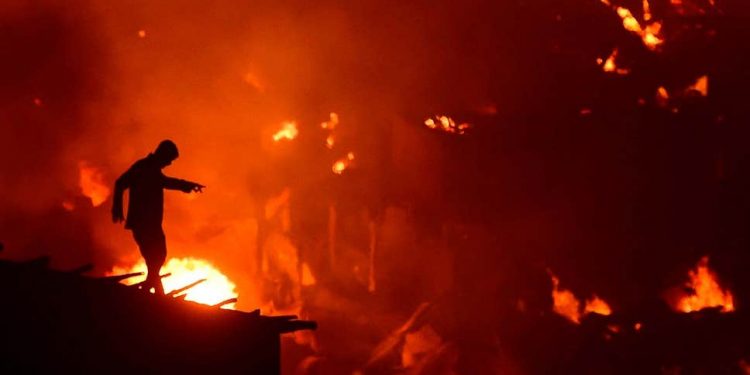 The fire broke out at in Dhaka's Mirpur neighbourhood late Friday and razed around 2,000 mostly tin shacks, fire services official Ershad Hossain said.