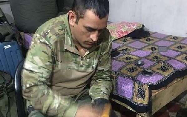 A picture of MS Dhoni polishing army boots goes viral