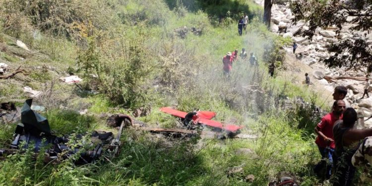 A private helicopter with three persons on board crashed near Moldi in the rain-hit Uttarkashi district after getting entangled in cables.