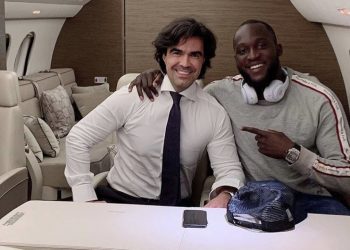 Romelu Lukaku with his agent.