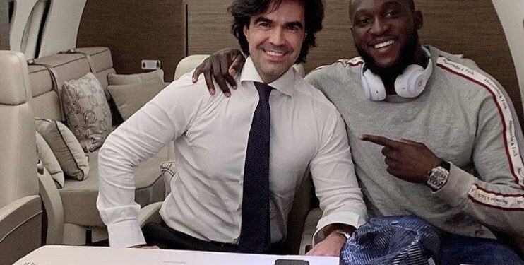 Romelu Lukaku with his agent.