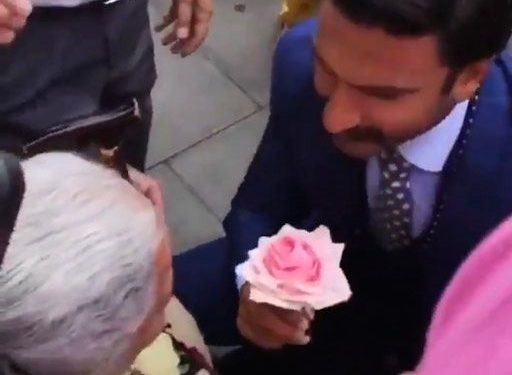 Ranveer goes down on knees for a lady in wheelchair, gets kiss on cheek