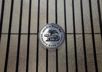 FILE PHOTO: A Reserve Bank of India (RBI) logo is seen at the entrance gate of its headquarters in Mumbai, India June 7, 2017. REUTERS/Shailesh Andrade/File Photo