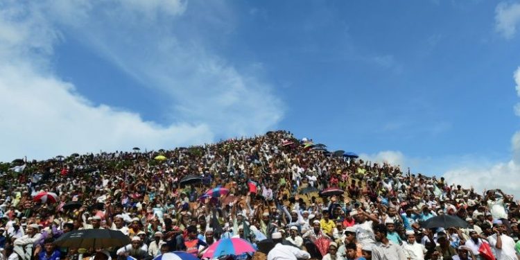 Under the scorching sun, thousands joined in a popular song with the lyrics ‘the world does not listen to the woes of Rohingya’.