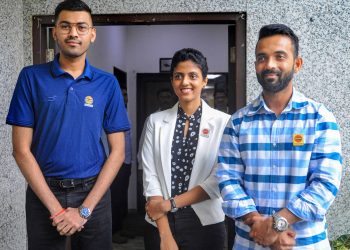Ajinkya Rahane (R) with other IOC employed sportspersons at a press conference Thursday