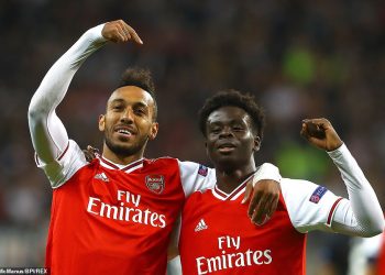 Two of the goal scorers for Arsenal Pierre-Emerick Aubameyang (L) and Bukayo Saka